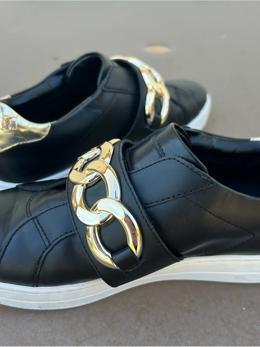Michael Kors Kenna Black Leather Slip-On Sneakers with Gold Chain Accent Sz 8.5
